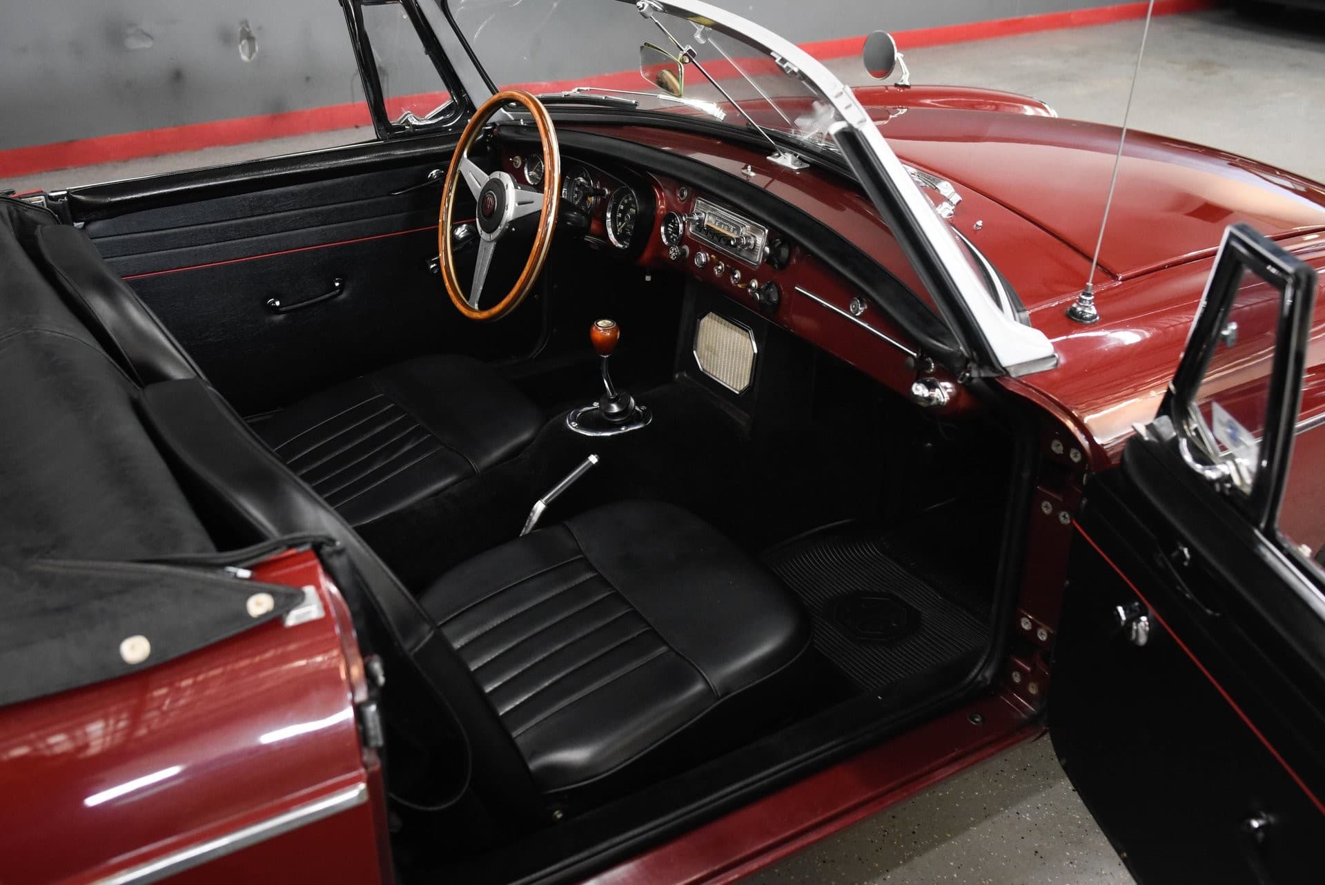 A classic MGB's leather interior after mobile paint correction and detailing in San Diego